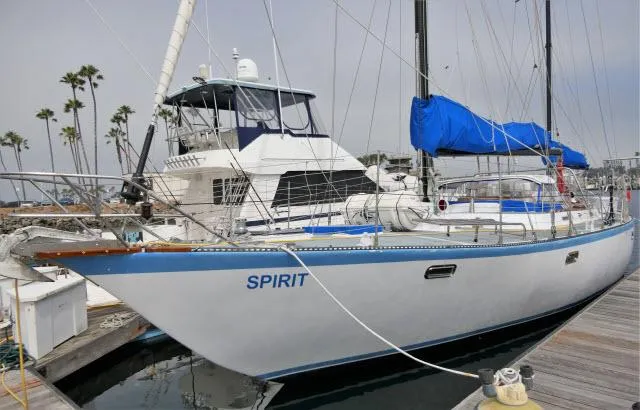 Spirit Yacht Photos Pics 1979 Roberts 54 sailboat named Spirit docked at a marina.