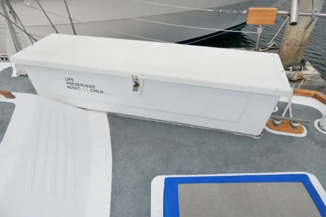 Spirit Yacht Photos Pics White life preserver storage box on deck of 1979 Roberts 54 sailboat.