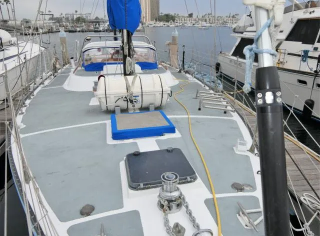Spirit Yacht Photos Pics 1979 Roberts 54 sailboat docked at marina, view of deck and equipment.