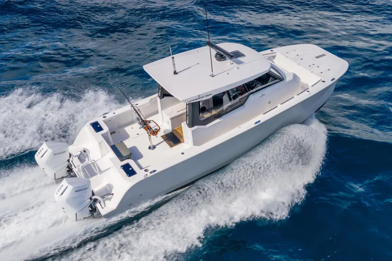  Yacht Photos Pics 2026 Hammer Yachts 35HH cruising on open water, showcasing sleek design and powerful engines.