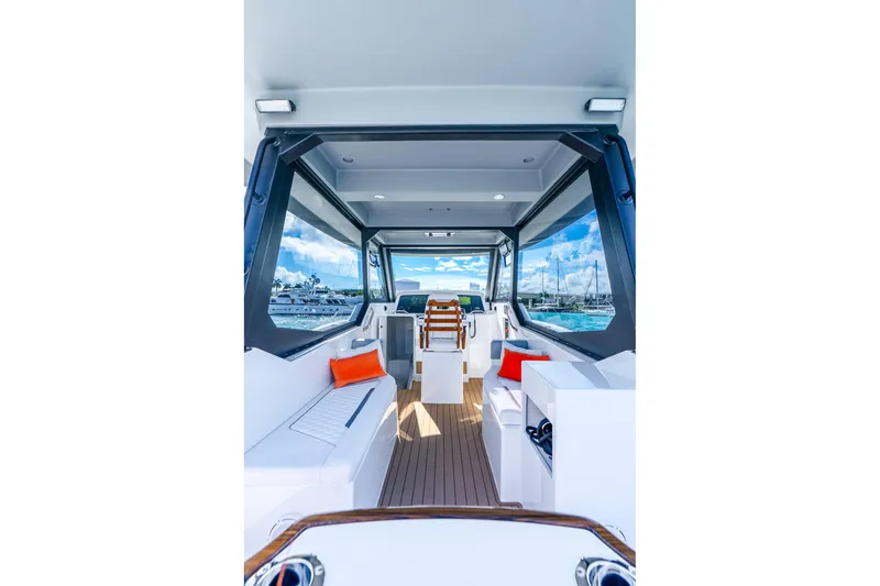  Yacht Photos Pics Interior view of 2026 Hammer Yachts 35HH, featuring sleek design and vibrant accents.