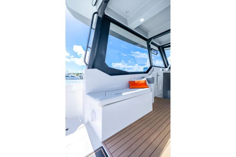  Yacht Photos Pics Interior of 2026 Hammer Yachts 35HH, featuring sleek seating and modern design elements.