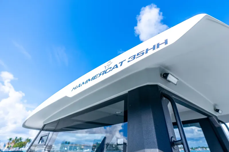  Yacht Photos Pics 2026 Hammer Yachts 35HH catamaran against a clear blue sky.