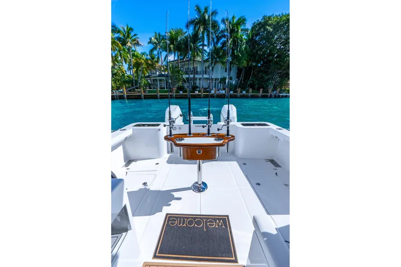  Yacht Photos Pics 2026 Hammer Yachts 35HH boat deck with fishing rods and welcome mat.