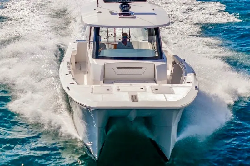  Yacht Photos Pics 2026 Hammer Yachts 35HH cruising on open water, showcasing sleek design and performance.