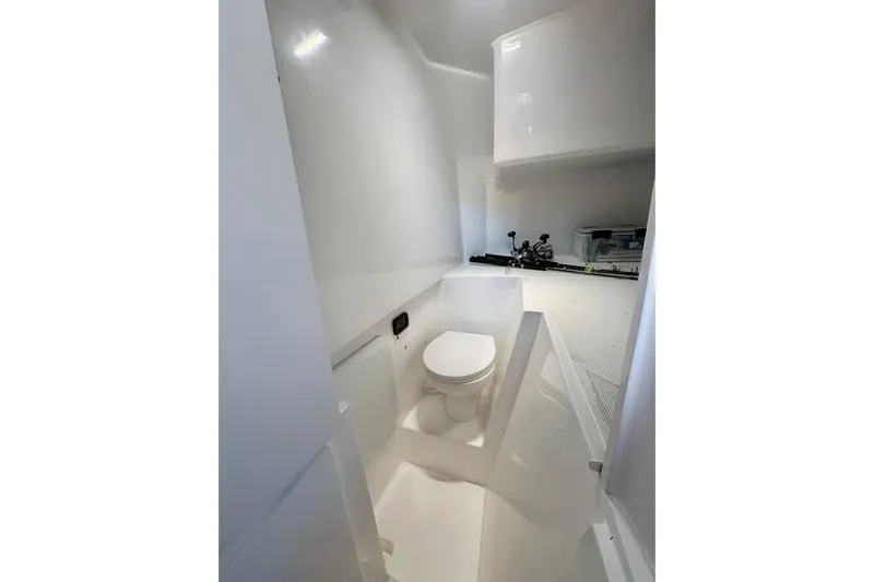  Yacht Photos Pics Modern bathroom in 2026 Hammer Yachts 35HH, featuring sleek white design and compact layout.