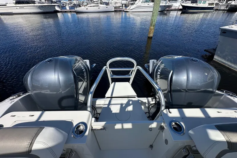 World Cat 296 Dc Yacht Photos Pics 2020 World Cat 296 DC boat with dual Yamaha engines docked at marina.