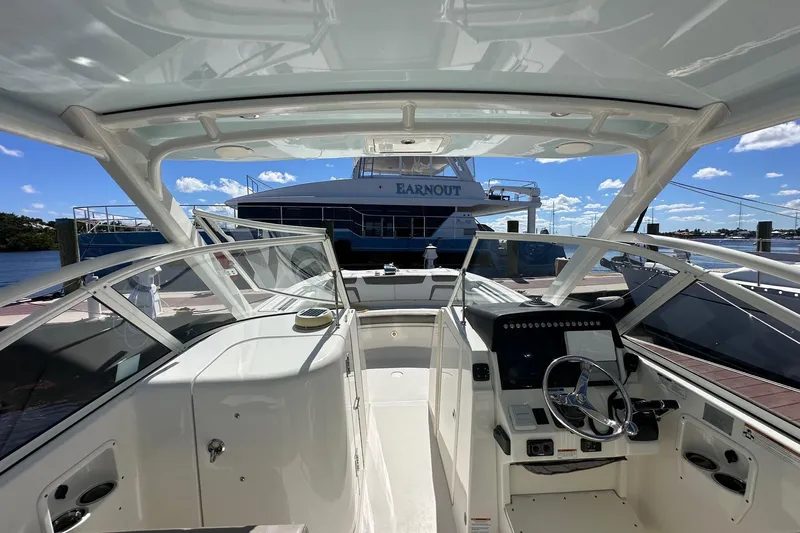 World Cat 296 Dc Yacht Photos Pics Interior view of 2020 World Cat 296 DC boat at dock, clear skies.