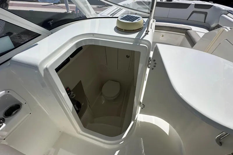 World Cat 296 Dc Yacht Photos Pics 2020 World Cat 296 DC boat interior with compact marine toilet.