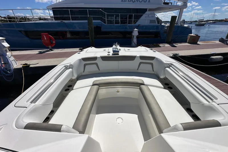 World Cat 296 Dc Yacht Photos Pics 2020 World Cat 296 DC boat interior with seating, docked at marina.