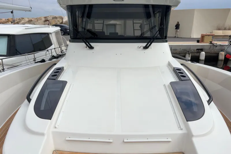  Yacht Photos Pics 2021 Bluegame BG42 yacht deck with sleek design and modern features.