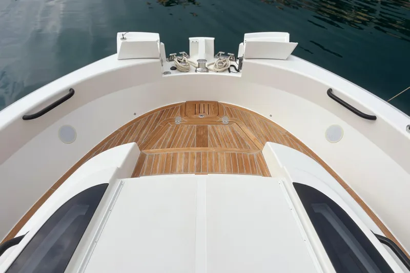  Yacht Photos Pics 2021 Bluegame BG42 yacht bow with teak deck and sleek design.