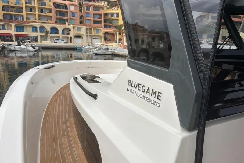  Yacht Photos Pics 2021 Bluegame BG42 yacht docked in marina, showcasing sleek design and luxury features.