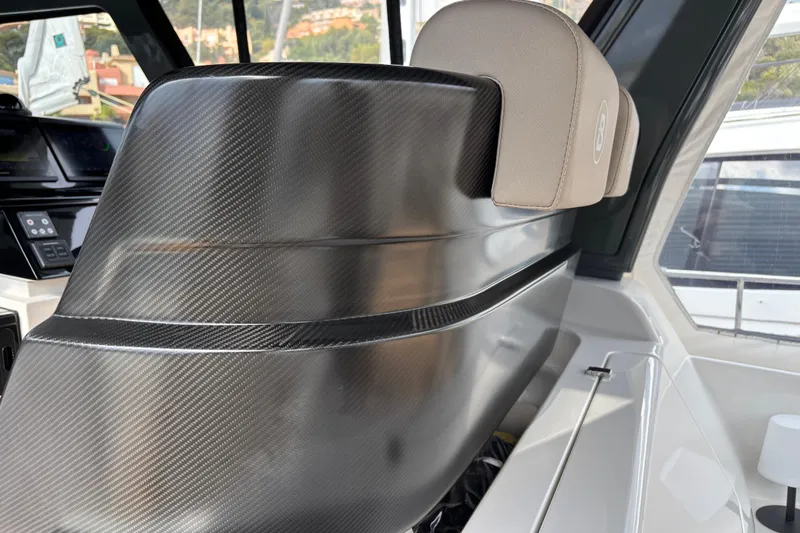  Yacht Photos Pics 2021 Bluegame BG42 yacht interior with carbon fiber detailing and modern design elements.