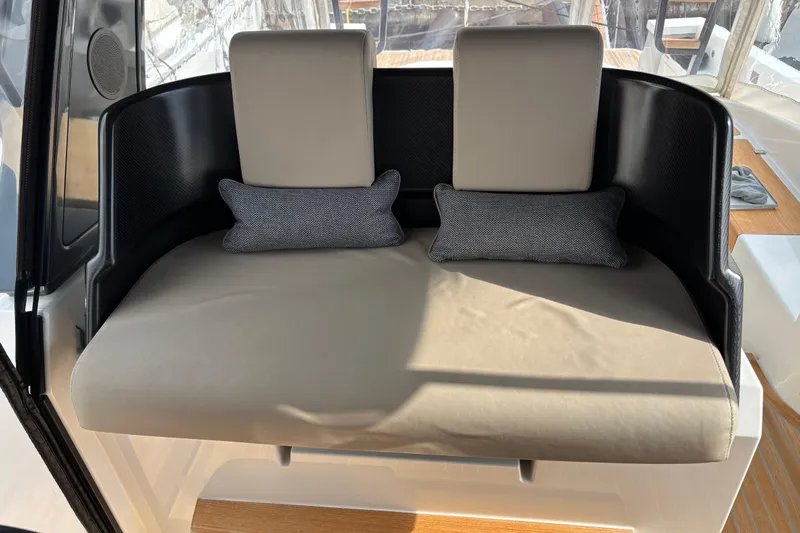  Yacht Photos Pics Luxurious seating area on 2021 Bluegame BG42 yacht with cushions and modern design.