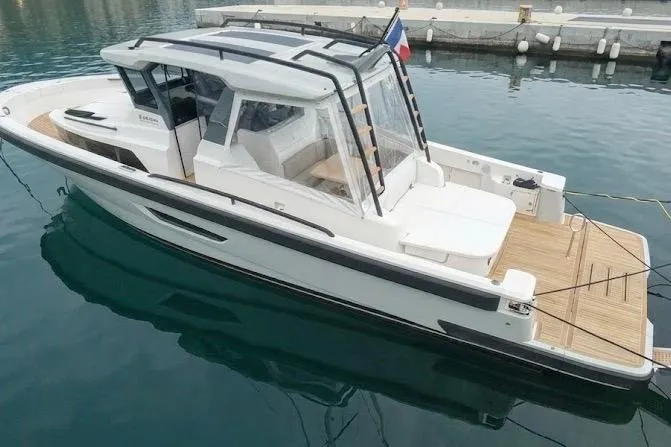  Yacht Photos Pics 2021 Bluegame BG42 yacht docked in calm marina waters.