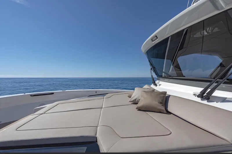  Yacht Photos Pics Luxurious 2021 Bluegame BG42 yacht with sunbathing area and ocean view.