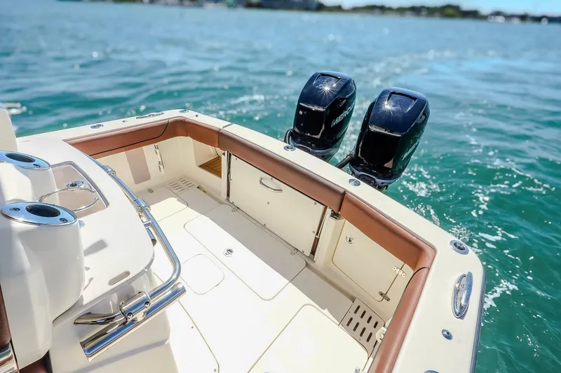  Yacht Photos Pics 2017 Scout 300 LXF boat with dual engines on open water.