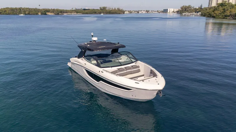  Yacht Photos Pics 2021 Cruisers Yachts 38 GLS OB 450R on calm blue water.