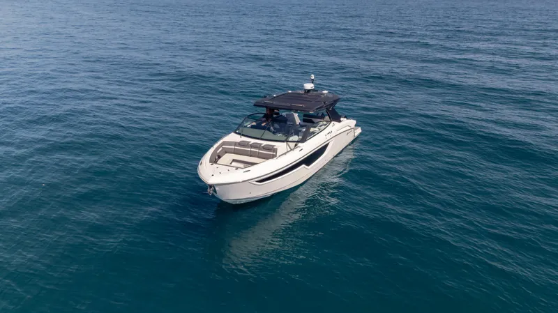  Yacht Photos Pics 2021 Cruisers Yachts 38 GLS OB 450R on open water, showcasing sleek design and luxury.