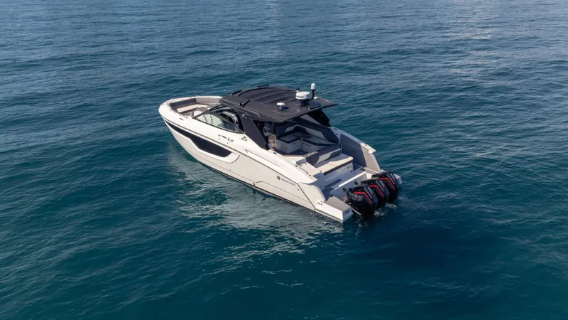  Yacht Photos Pics 2021 Cruisers Yachts 38 GLS OB 450R on open water, showcasing sleek design and powerful engines.