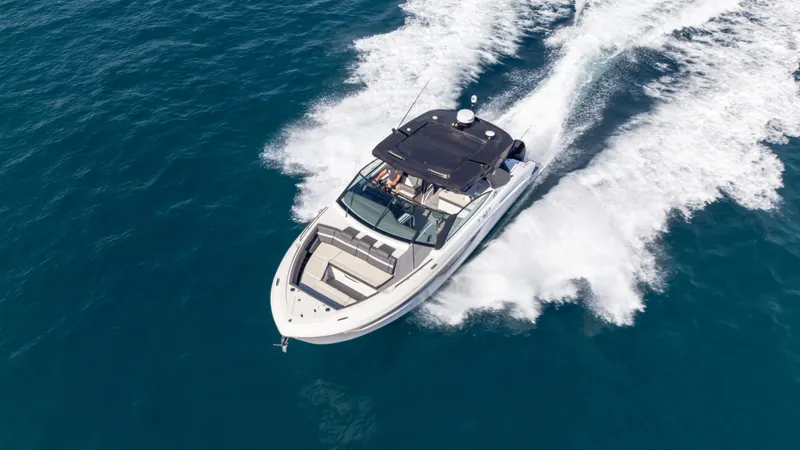  Yacht Photos Pics 2021 Cruisers Yachts 38 GLS OB 450R speeding on open water.