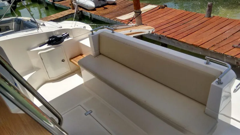 Dreamer Yacht Photos Pics 2013 Azimut 40 Flybridge yacht with seating area and dock view.
