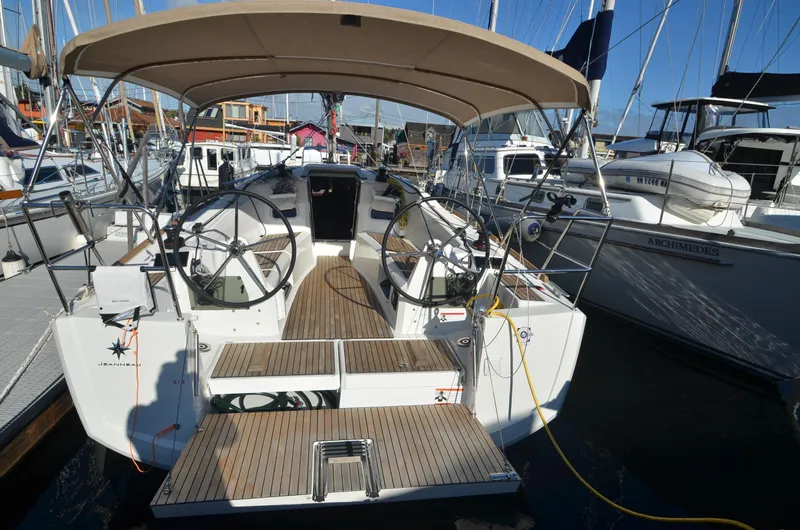 Sea To Summit Yacht Photos Pics 2022 Jeanneau Sun Odyssey 349 sailboat with dual steering wheels and spacious cockpit.