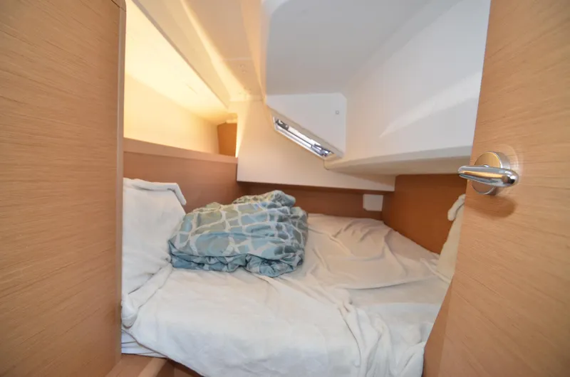 Sea To Summit Yacht Photos Pics Cozy cabin interior of 2022 Jeanneau Sun Odyssey 349 sailboat.