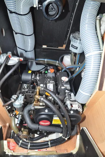 Sea To Summit Yacht Photos Pics Engine compartment of 2022 Jeanneau Sun Odyssey 349 sailboat, showing detailed mechanical components.