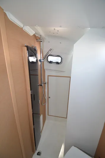 Sea To Summit Yacht Photos Pics 2022 Jeanneau Sun Odyssey 349 bathroom with modern shower and sleek design.