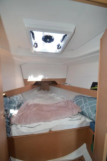 Sea To Summit Yacht Photos Pics Cozy cabin interior of 2022 Jeanneau Sun Odyssey 349 sailboat.