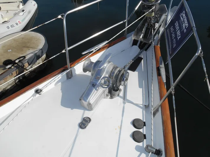 Eventus Yacht Photos Pics Deck of 2000 Beneteau Oceanis 50 sailboat with anchor winch and railing.