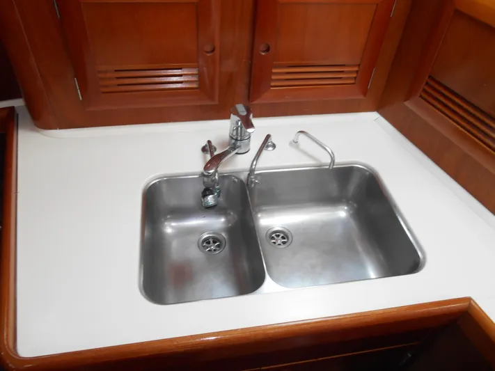 Eventus Yacht Photos Pics Double stainless steel sink in Beneteau Oceanis 50 yacht kitchen, 2000 model.