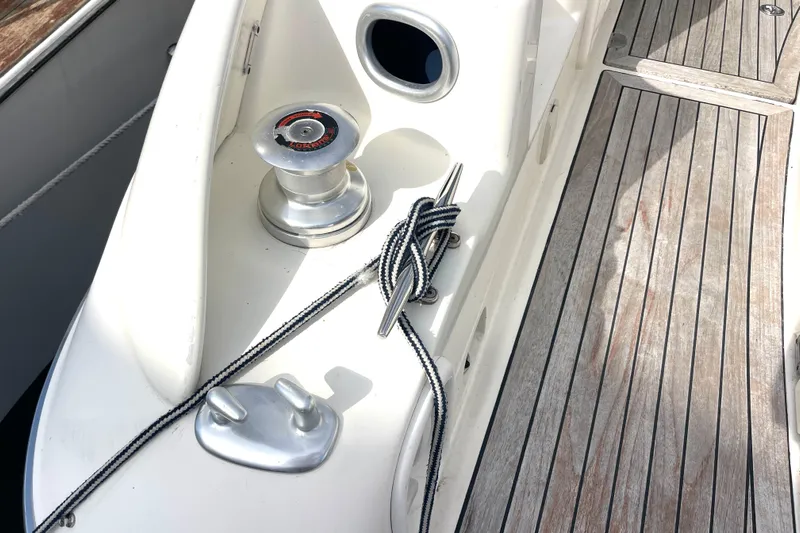 Saphir Bleu Yacht Photos Pics 2006 Cranchi Mediterranee 50 HT yacht deck with winch and rope detail.