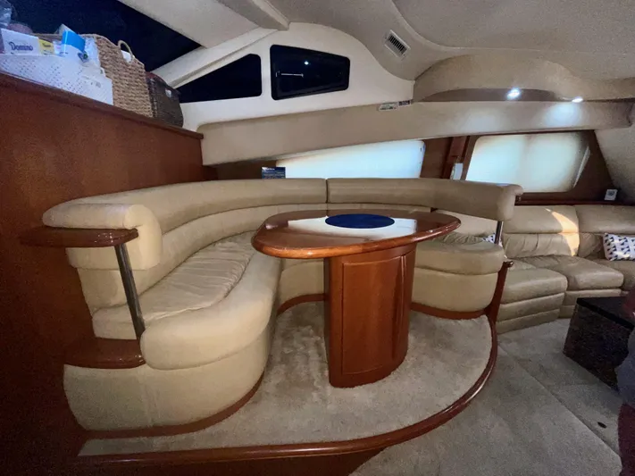 Knot On Call II Yacht Photos Pics Luxurious interior of 2006 Silverton 43 Sport Bridge yacht with plush seating.