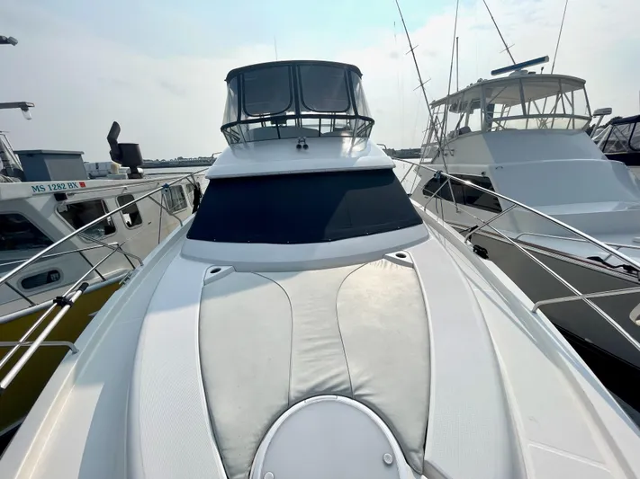 Knot On Call II Yacht Photos Pics 2006 Silverton 43 Sport Bridge yacht docked at marina.