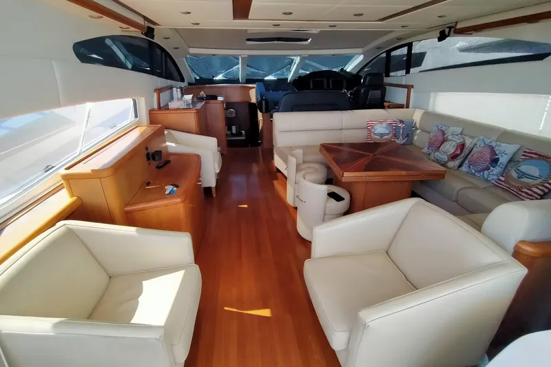  Yacht Photos Pics Luxurious interior of 2007 Sunseeker Predator 72 yacht with elegant seating and wooden accents.