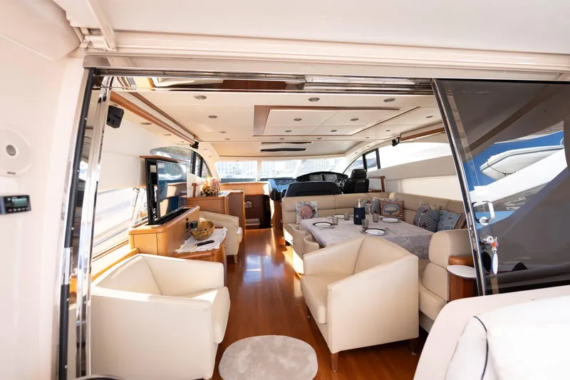  Yacht Photos Pics Luxurious interior of 2007 Sunseeker Predator 72 yacht with elegant seating and dining area.