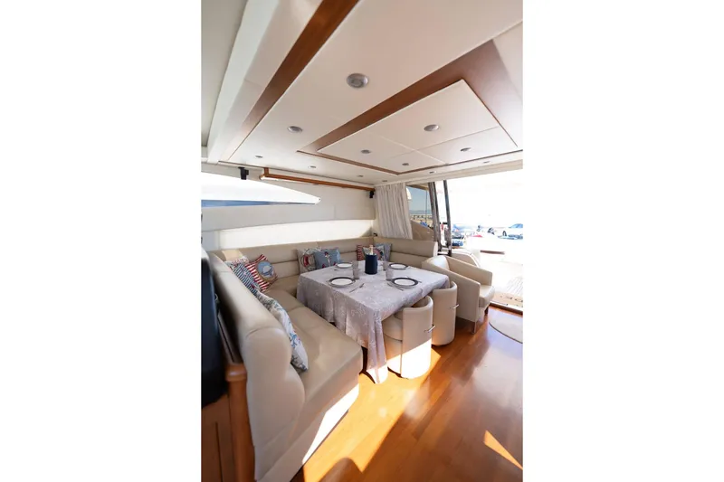  Yacht Photos Pics Luxurious interior of 2007 Sunseeker Predator 72 yacht with elegant dining area.