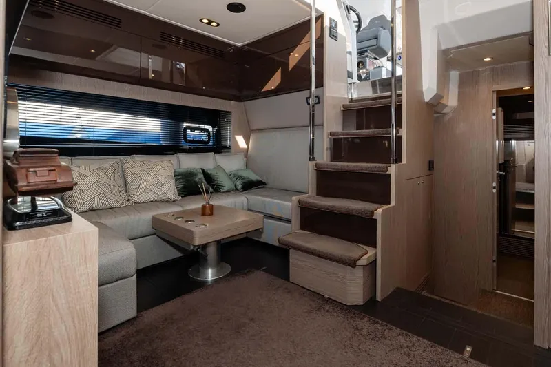  Yacht Photos Pics Luxurious interior of 2018 Azimut Atlantis 51 yacht with modern seating and elegant design.