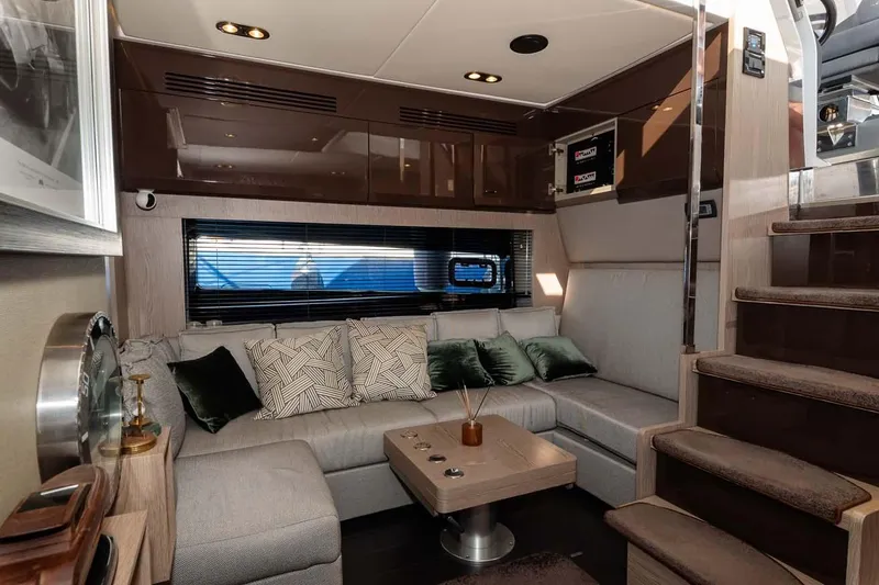  Yacht Photos Pics Luxurious interior of 2018 Azimut Atlantis 51 yacht with modern seating and elegant decor.
