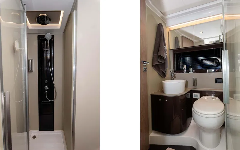  Yacht Photos Pics Luxurious bathroom interior of 2018 Azimut Atlantis 51 yacht, featuring modern shower and toilet.