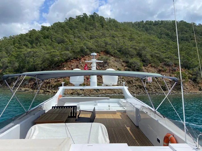  Yacht Photos Pics Luxury yacht Cantieri di Pisa Akhir 30S, 1992, docked near lush green hillside.