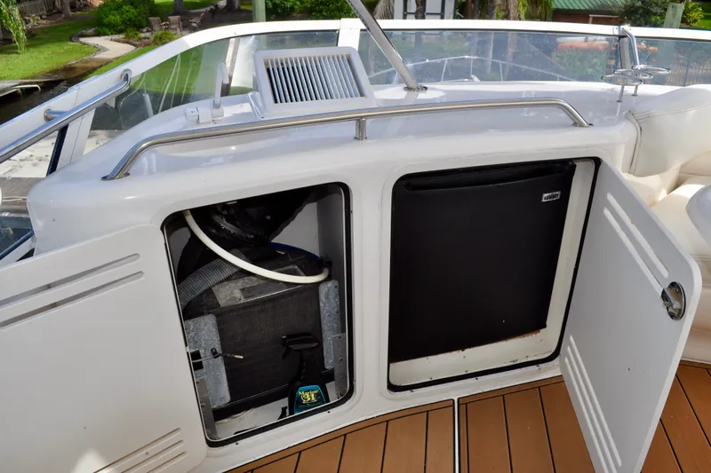 King Leisure Yacht Photos Pics 2002 Sea Ray 480 Sedan Bridge yacht with open storage compartments on deck.