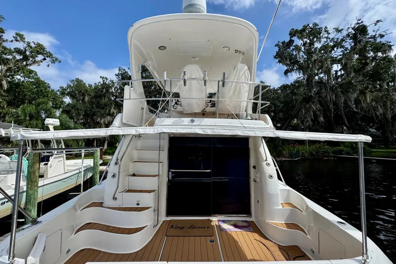 King Leisure Yacht Photos Pics 2002 Sea Ray 480 Sedan Bridge yacht with spacious deck and elegant design.