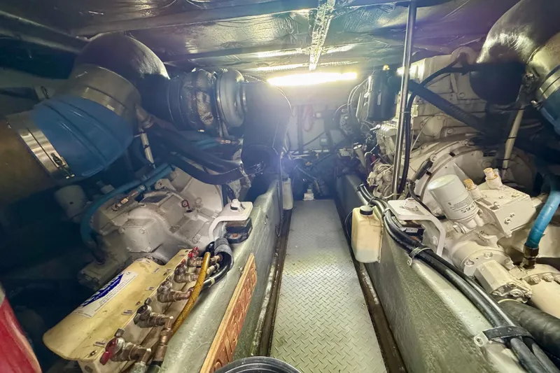 King Leisure Yacht Photos Pics Engine room of a 2002 Sea Ray 480 Sedan Bridge yacht, showcasing mechanical components.