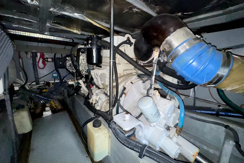 King Leisure Yacht Photos Pics Engine room of 2002 Sea Ray 480 Sedan Bridge with visible components and hoses.