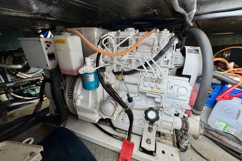 King Leisure Yacht Photos Pics Engine room of a 2002 Sea Ray 480 Sedan Bridge, showcasing mechanical components.