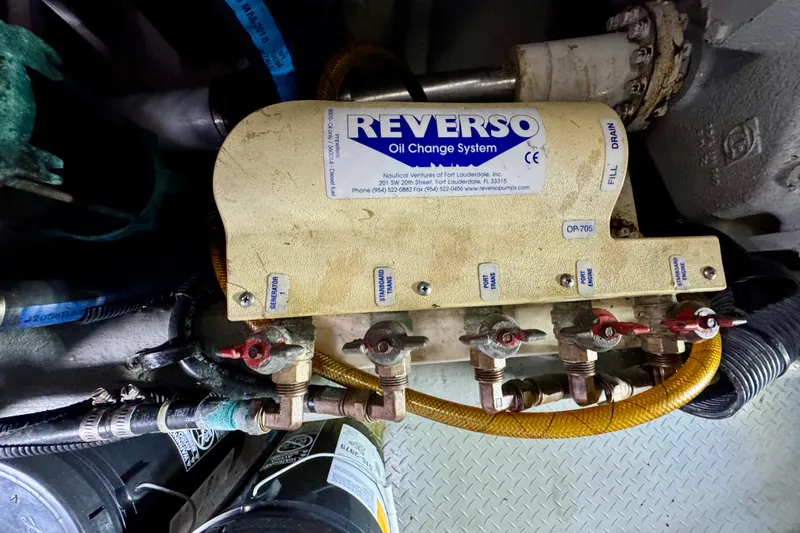 King Leisure Yacht Photos Pics Reverso oil change system in 2002 Sea Ray 480 Sedan Bridge engine room.